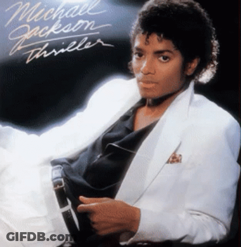 A Man In A White Suit Is On The Cover Of Michael Jackson 'S Thriller Album GIF