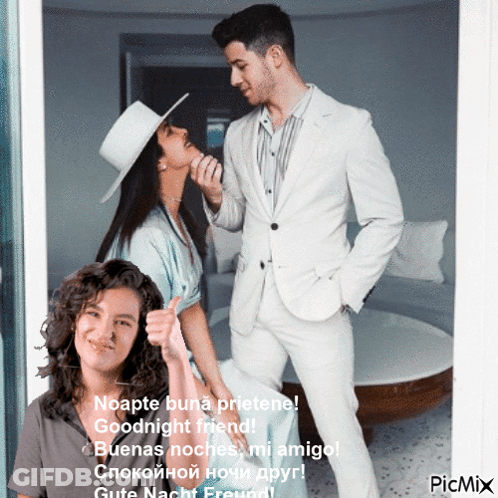 A Man In A White Suit Is Standing Next To A Woman In A Hat And Giving A Thumbs Up GIF