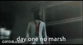 A Man In A White Suit Is Walking In A Dark Room With The Words Day One No Marsh On The Bottom GIF