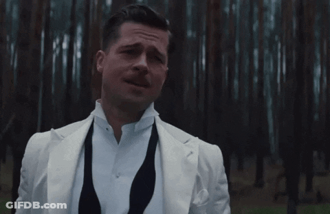 A Man In A White Suit Stands In Front Of A Forest With The Words To Si Nemyslim Written Below Him GIF