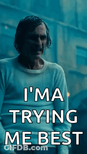 A Man In A White Sweater With The Words I 'M Trying Me Best On It GIF