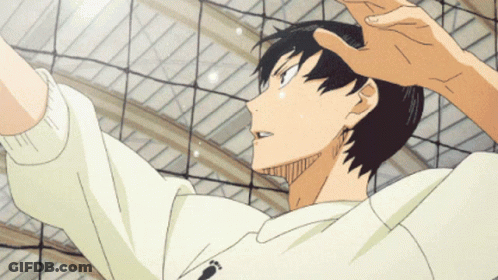 A Man In A White Sweatshirt With A Footprint On It Is Jumping Over A Volleyball Net GIF