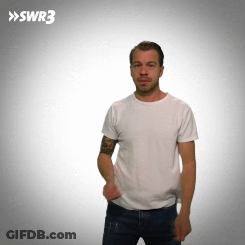 A Man In A White T-Shirt Is Standing In Front Of A White Background With Swr3 Written On It GIF