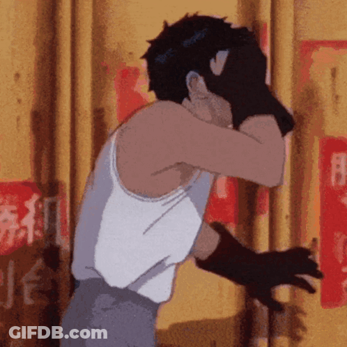 A Man In A White Tank Top Covering His Face With His Hand GIF