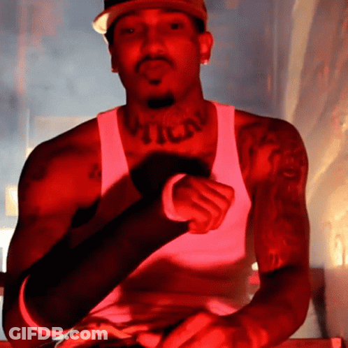 A Man In A White Tank Top Has A Tattoo On His Neck That Says I Love GIF