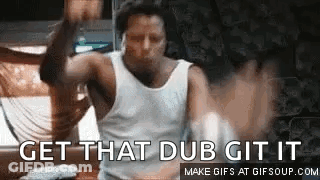 A Man In A White Tank Top Is Dancing With The Words `` Get That Dub Git It '' Written Above Him . GIF