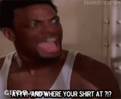A Man In A White Tank Top Is Making A Funny Face And Saying `` And Where Your Shirt At ? '' . GIF