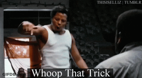 A Man In A White Tank Top Is Pointing At Another Man In A Black Shirt . GIF