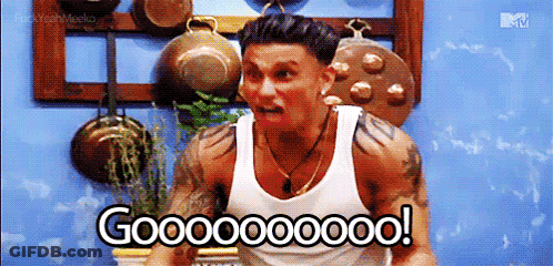 A Man In A White Tank Top Is Screaming In A Kitchen And Says Gooooooo ! GIF