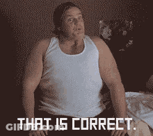 A Man In A White Tank Top Is Sitting On A Bed With The Words That Is Correct On The Bottom GIF