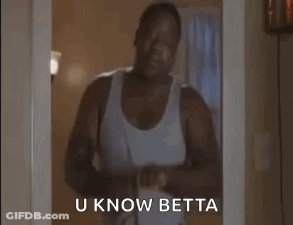 A Man In A White Tank Top Is Standing In A Doorway Holding A Belt And Says `` U Know Betta '' . GIF
