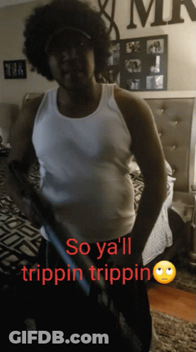 A Man In A White Tank Top With The Words So Ya 'Ll Trippin Trippin Below Him GIF