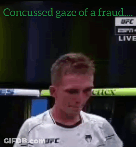 A Man In A White Ufc Shirt Is Crying On A Tv Screen GIF