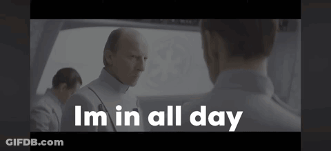 A Man In A White Uniform Is Talking To Another Man And The Words I 'M In All Day Are Above Him . GIF