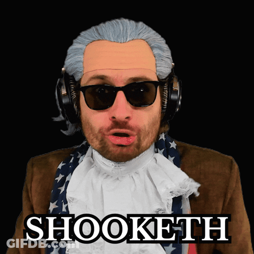 A Man In A Wig And Sunglasses Has The Word Shooketh On His Face GIF