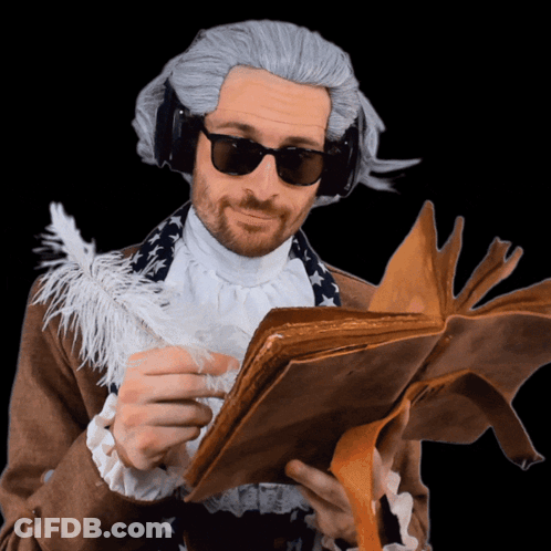 A Man In A Wig And Sunglasses Holds A Book GIF