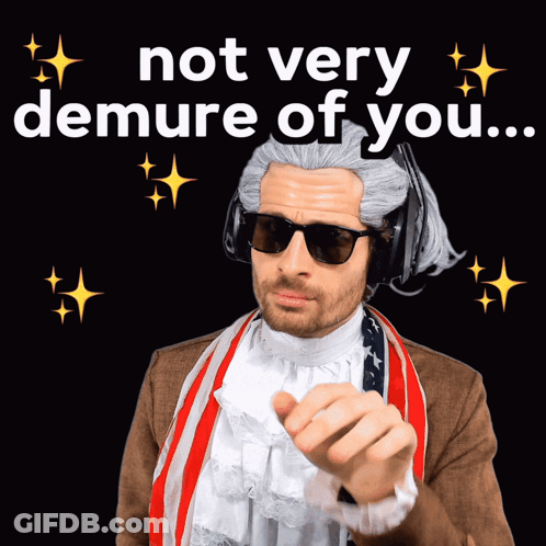 A Man In A Wig And Sunglasses Is Pointing At The Camera With The Words Not Very Demure Of You Behind Him GIF