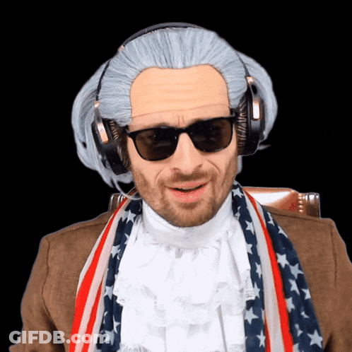A Man In A Wig And Sunglasses Is Wearing Headphones And A Scarf GIF