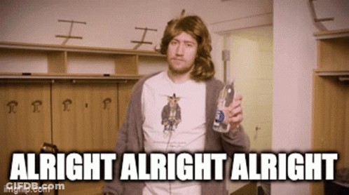 A Man In A Wig Is Holding A Bottle Of Vodka And The Caption Says Alright Alright Alright GIF