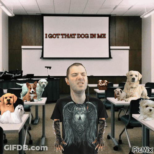 A Man In A Wolf Shirt Stands In Front Of A Screen That Says " I Got That Dog In Me " GIF