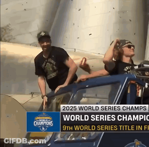 A Man In A World Series Champions Shirt Rides In A Car GIF