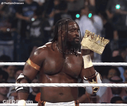A Man In A Wrestling Ring With A Crown On His Head And A Caption That Says The Kamdreesen GIF