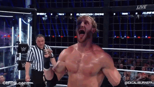 A Man In A Wrestling Ring With A Referee Behind Him And The Word Live On The Bottom GIF