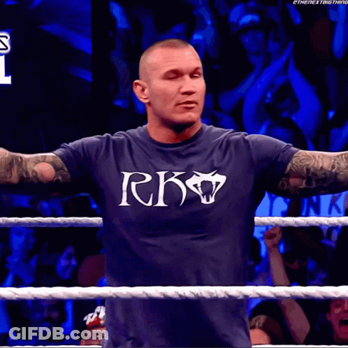 A Man In A Wrestling Ring With A Sign Behind Him That Says Mr. Miss Texas GIF