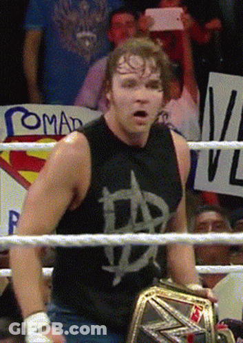 A Man In A Wrestling Ring With A Sign That Says Romad GIF