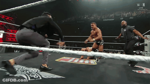 A Man In A Wrestling Ring With A Sign That Says ' Ticketmaster ' On It GIF