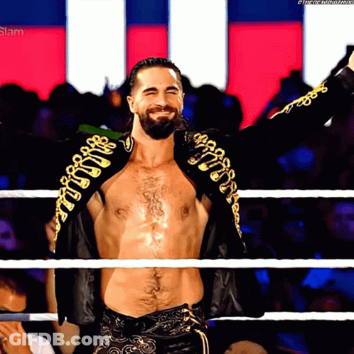 A Man In A Wrestling Ring With His Arms Outstretched And The Word Slam On The Bottom Right GIF