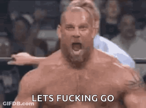 A Man In A Wrestling Ring With His Mouth Open And The Words Lets Fucking Go Above Him GIF