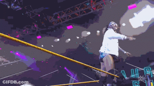 A Man In A Wrestling Ring With The Name August Grey On The Wall GIF