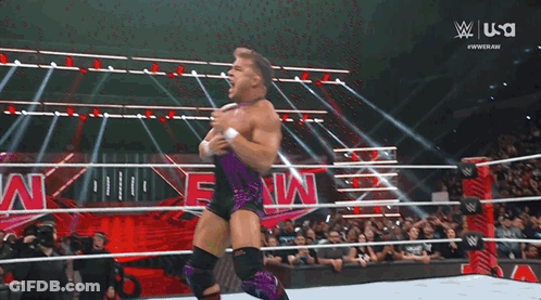 A Man In A Wrestling Ring With The USA Logo On The Bottom Right GIF