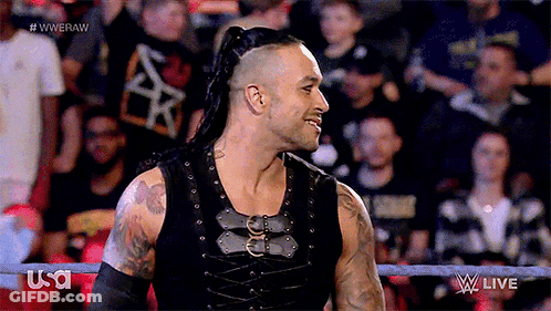 A Man In A Wrestling Ring With The Word USA On The Bottom Right GIF