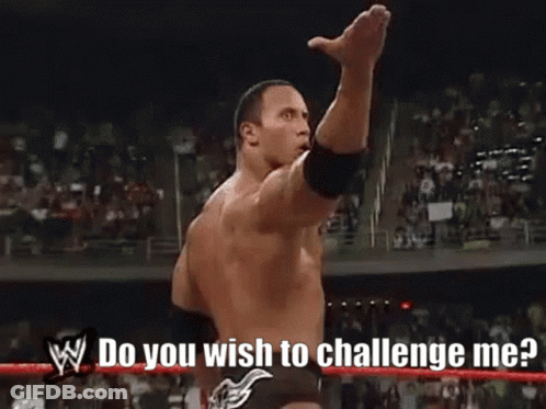 A Man In A Wrestling Ring With The Words Do You Wish To Challenge Me GIF
