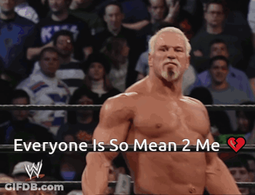 A Man In A Wrestling Ring With The Words Everyone Is So Mean 2 Me Above Him GIF