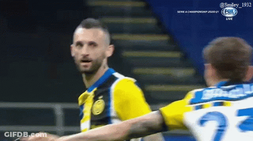 A Man In A Yellow And Black Jersey With The Number 22 On It GIF