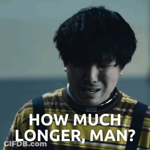 A Man In A Yellow And Brown Striped Shirt Is Crying And Asking How Much Longer Man GIF