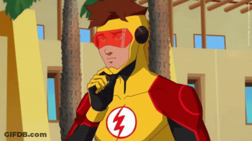 A Man In A Yellow And Red Superhero Costume Has A Lightning Bolt On His Chest GIF