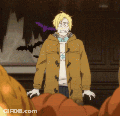 A Man In A Yellow Coat Stands In Front Of A Wall With Bats Flying In The Background GIF