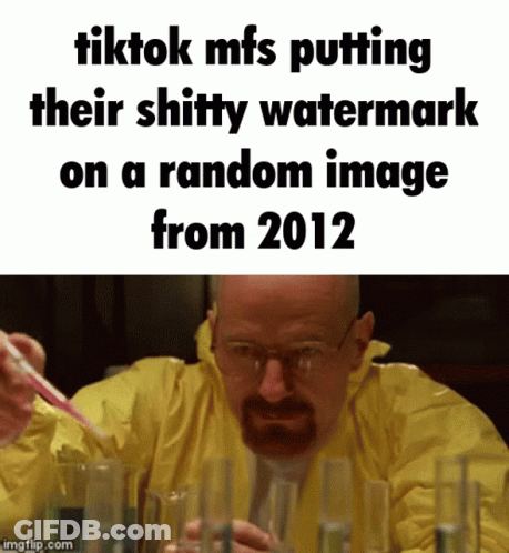 A Man In A Yellow Jacket Is Holding A Pipette In Front Of A Bunch Of Test Tubes GIF