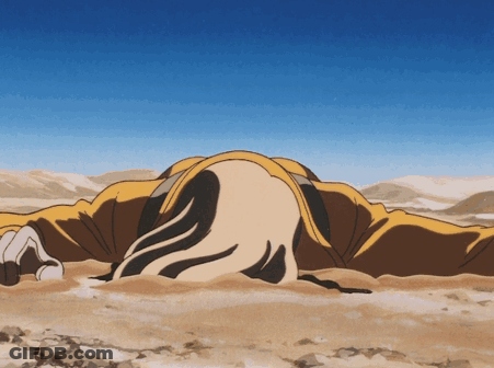 A Man In A Yellow Jacket Is Laying In The Dirt GIF