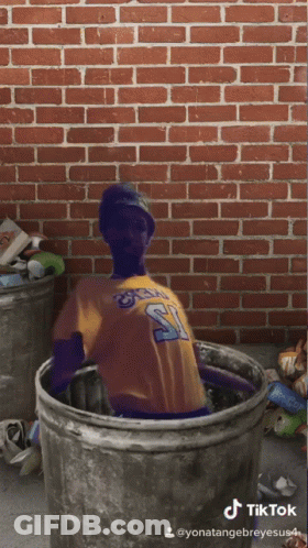 A Man In A Yellow Jersey With The Number 21 On It GIF