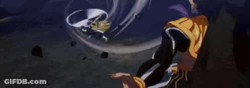 A Man In A Yellow Kimono With Chinese Writing On It Is Laying Down GIF