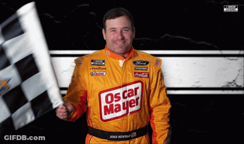 A Man In A Yellow Oscar Mayer Jacket Holds A Checkered Flag GIF
