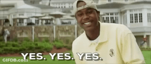 A Man In A Yellow Shirt And Hat Is Smiling And Says `` Yes . Yes . Yes . '' GIF
