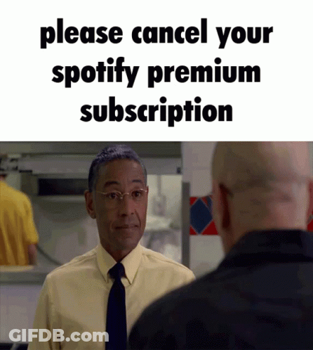 A Man In A Yellow Shirt And Tie Is Asking Another Man To Cancel His Spotify Premium Subscription .. GIF