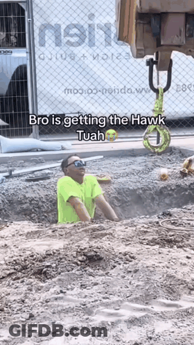 A Man In A Yellow Shirt Is Getting The Hawk Tuan GIF