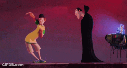 Man In Yellow Shirt Kneeling Before Vampire GIF